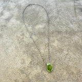 peridot geometric pendant