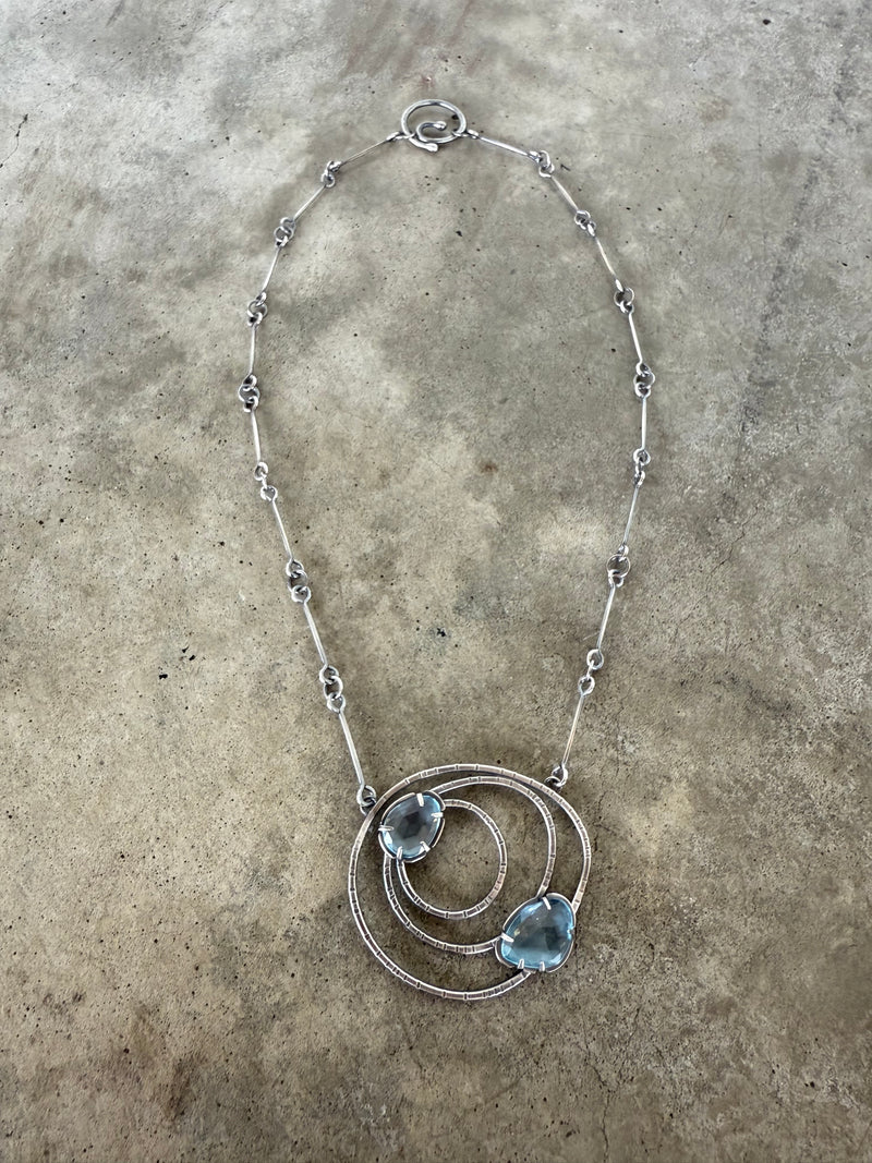 small constellation necklace with blue topaz