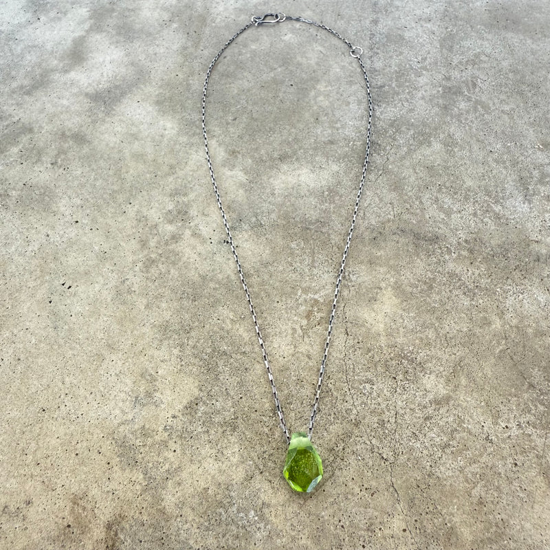 peridot geometric pendant