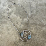 small constellation necklace with blue topaz