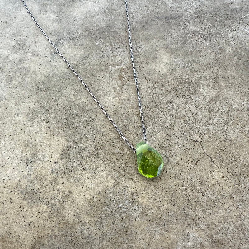 peridot geometric pendant