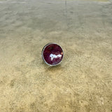 faceted round ruby ring
