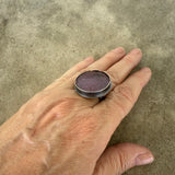 faceted round ruby ring