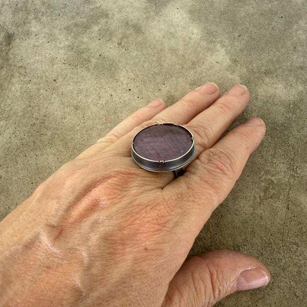 faceted round ruby ring