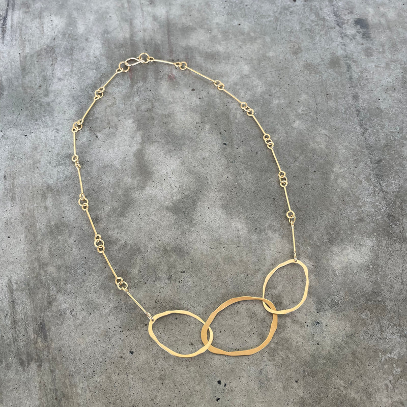 three interlocking rough cut necklace-vermeil
