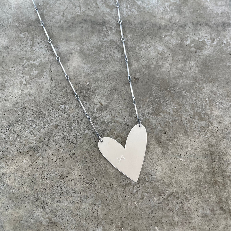 Asymmetrical heart necklace deals